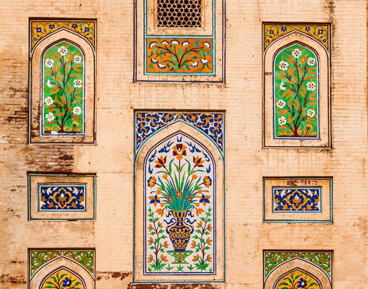 Exterior wall inset with colorful mosaics